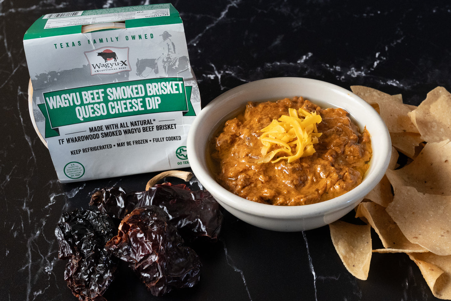 Wagyu-X smoked brisket queso dip served with tortilla chips