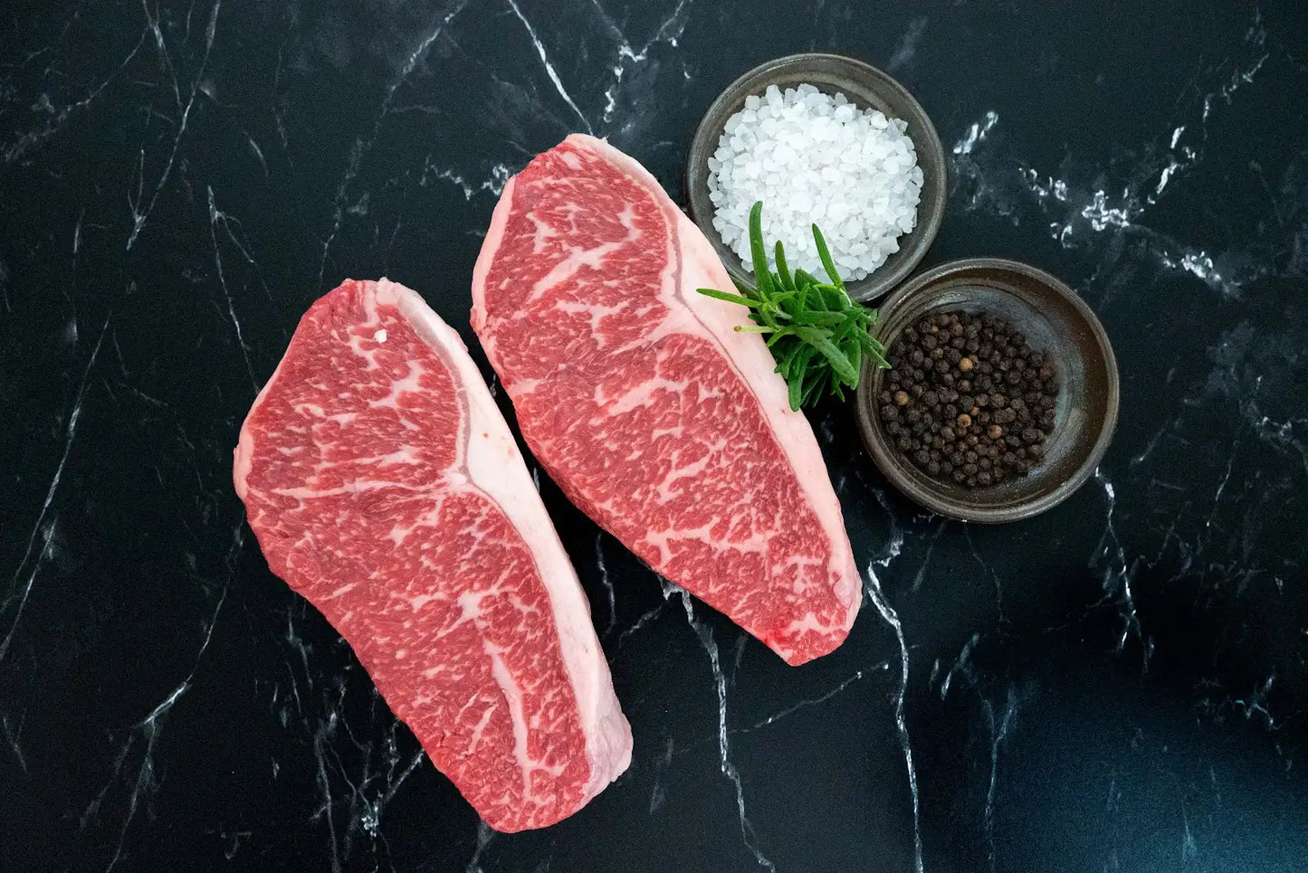 2 Wagyu X New York Strips (14oz each)— Fire Up the Grill only $65!